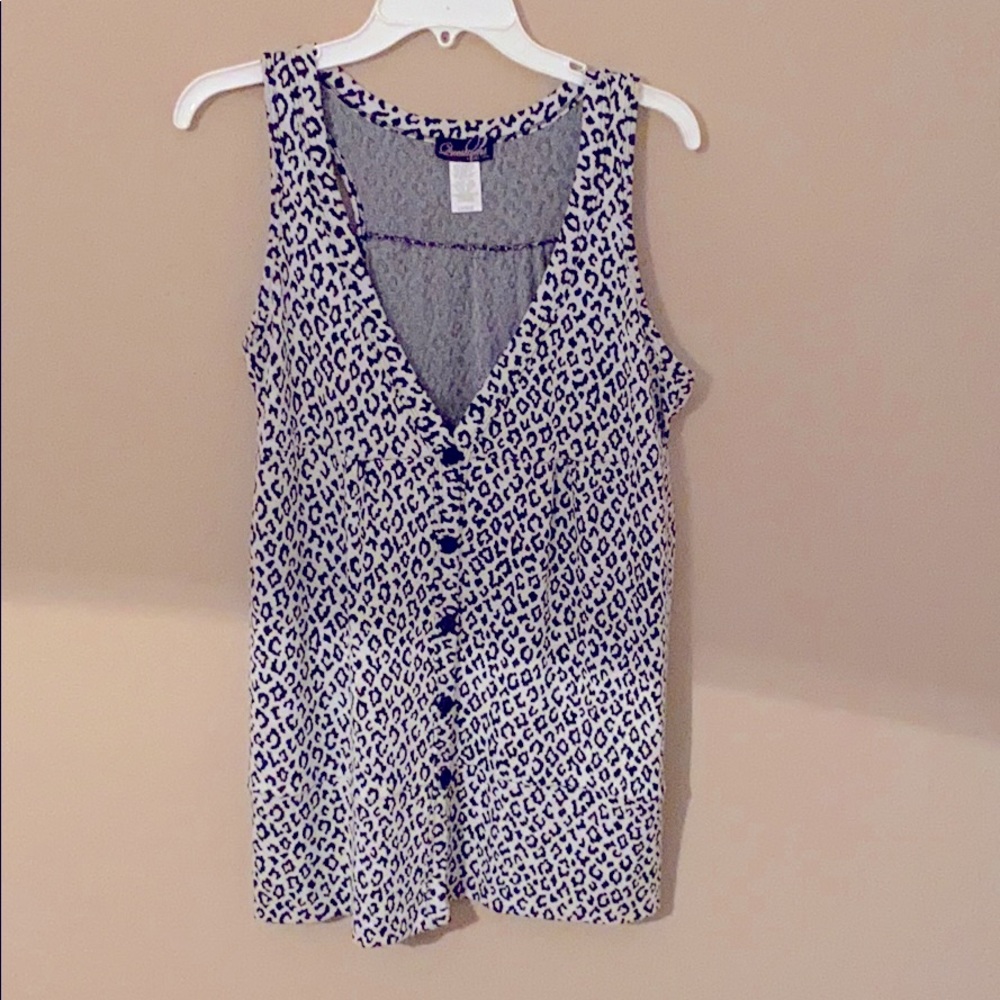 Animal print button up top banded at the bottom.